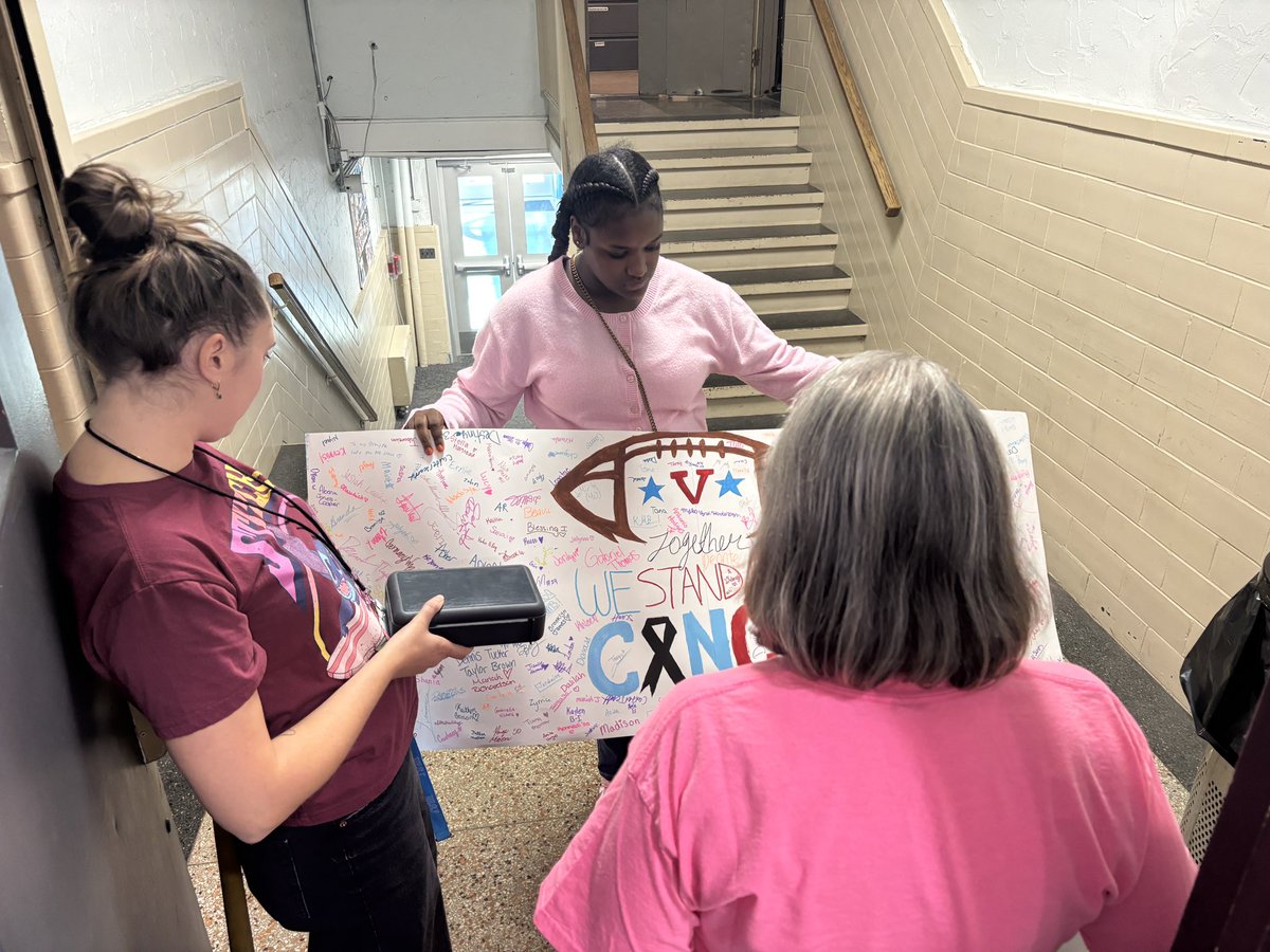 VASJHighSchool's tweet photo. A very special #fridaynightlights as both teams, students, staff &amp; fans will Stand Up to Cancer in the name of Christine McManus, a former staff member who lost her battle with breast cancer in 2024. Today, the entire #Viking community signed this banner created by the students https://t.co/bWDcrJLPIQ