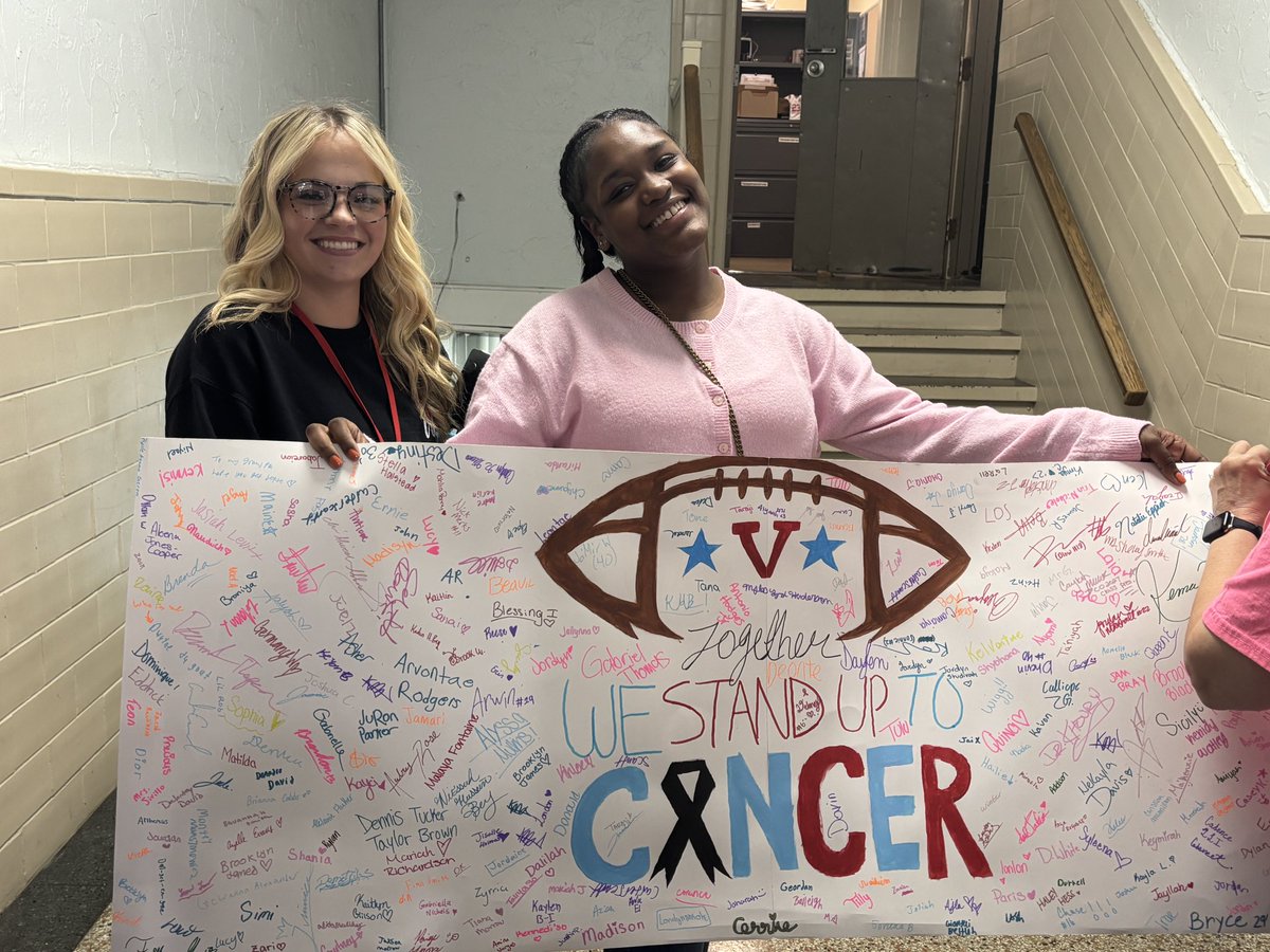 VASJHighSchool's tweet photo. A very special #fridaynightlights as both teams, students, staff &amp; fans will Stand Up to Cancer in the name of Christine McManus, a former staff member who lost her battle with breast cancer in 2024. Today, the entire #Viking community signed this banner created by the students https://t.co/bWDcrJLPIQ
