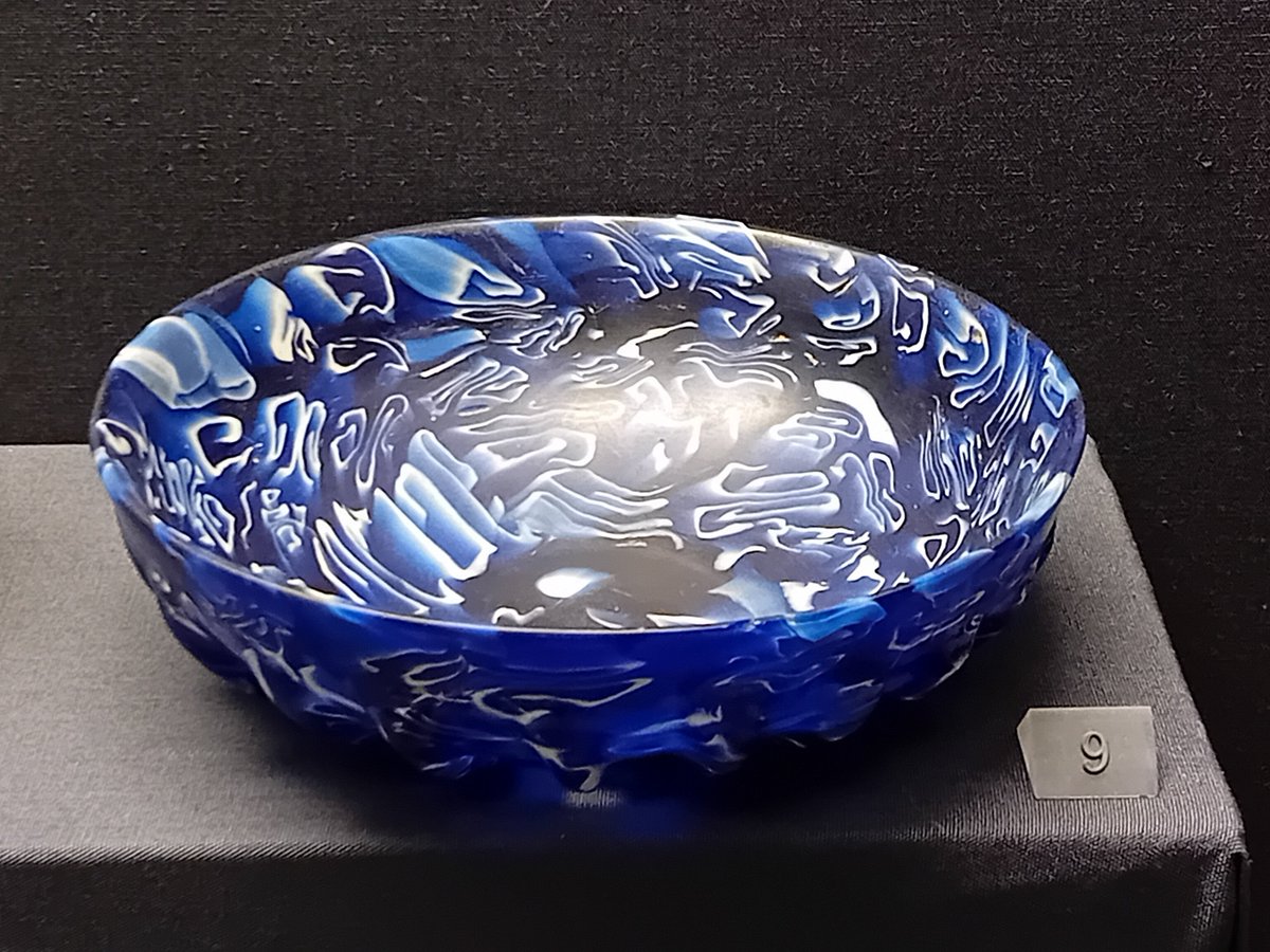 DrJEBall's tweet photo. A #Roman glass bowl, in a beautiful cobalt blue with an irregular swirling white pattern. It looks amazing - especislly given that it is nearly 2000 years old! #Archaeology https://t.co/ZisFqg8tyQ