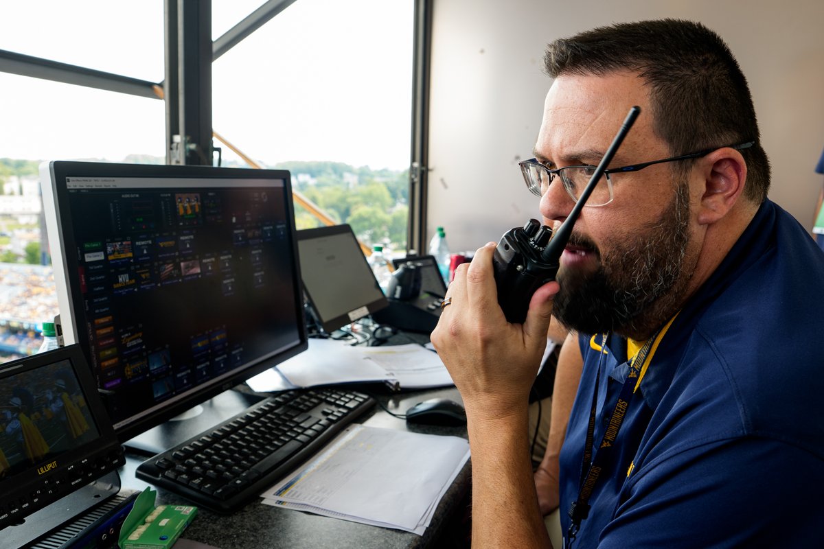 WestVirginiaU's tweet photo. What does it take to fire up 60,000+ Mountaineers on game day? 🏈

From music to graphics, nothing is random. For 16 years, West Virginia native Sean Merinar has been curating your game day experience. 💛💙🎤

Take a look behind the scenes:
https://t.co/Tv9TKsJoA6 https://t.co/6j12l6QYT6