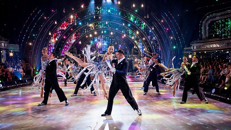 StrictlySparks's tweet photo. Week 1 songs, dances and pro routine
#Strictly 
Strictly 2026 Week One Song and Dance List

🪩Bethany & Nancy - Quickstep to Stop This Flame by Celeste

🪩Dani & Nikita - Samba to Lush Life by Zara Larsson

🪩Delta & Kai - Samba to Baianá by Barbatuques

🪩Jaime & Carlos - Tango to I Feel Love by Donna Summer

🪩 Lacey & Vito - Cha Cha to How Will I Know by Whitney Houston

🪩 Melanie & Aljaž - Cha Cha to Don’t Go Breaking My Heart by Elton John and Kiki Dee

🪩 Dame Sarah & Julian - Quickstep to C’est Magnifique by Kay Starr

🪩 Tabby & Mark - Jive to Animal by KATSEYE

🪩Cach & Maddie - Quickstep to I Just Might by Bruno Mars

🪩 Chris & Amy - Tango to No Roots by Alice Merton

🪩 Graeme & Lauren - Cha Cha to Hound Dog (Smokey Joe's Café version)

🪩 John & Katya - Foxtrot to Ordinary by Alex Warren

🪩 Lawrence & Jowita - Paso Doble to Aperture by Harry Styles

🪩Shaun & Alexis - Cha Cha to Lil Boo Thang by Paul Russell

🪩 Will & Dianne - Samba to Rock DJ by Robbie Williams

Ahead of the couples' ballroom debuts, the Strictly Professionals - plus the hosts and judges - open the show with a dazzling group number set to an epic orchestral version of Joy by RAYE.