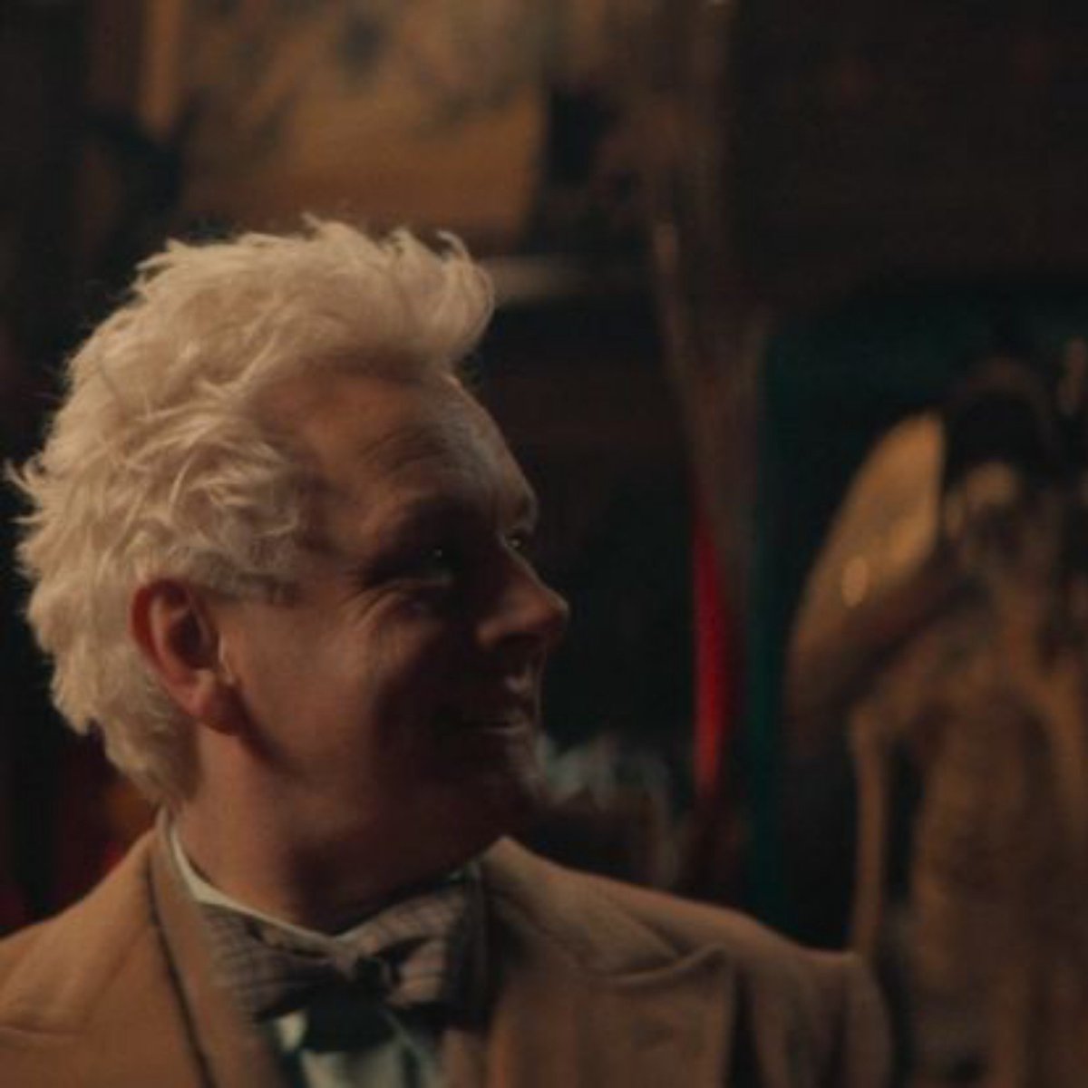 Sandyona_03's tweet photo. The way Aziraphale looks at Crowley in 1941 is just a separate shade of "love looks" 
The angel was failing so hard at hiding his interest in the demon👀 https://t.co/gAwn3uw6vj