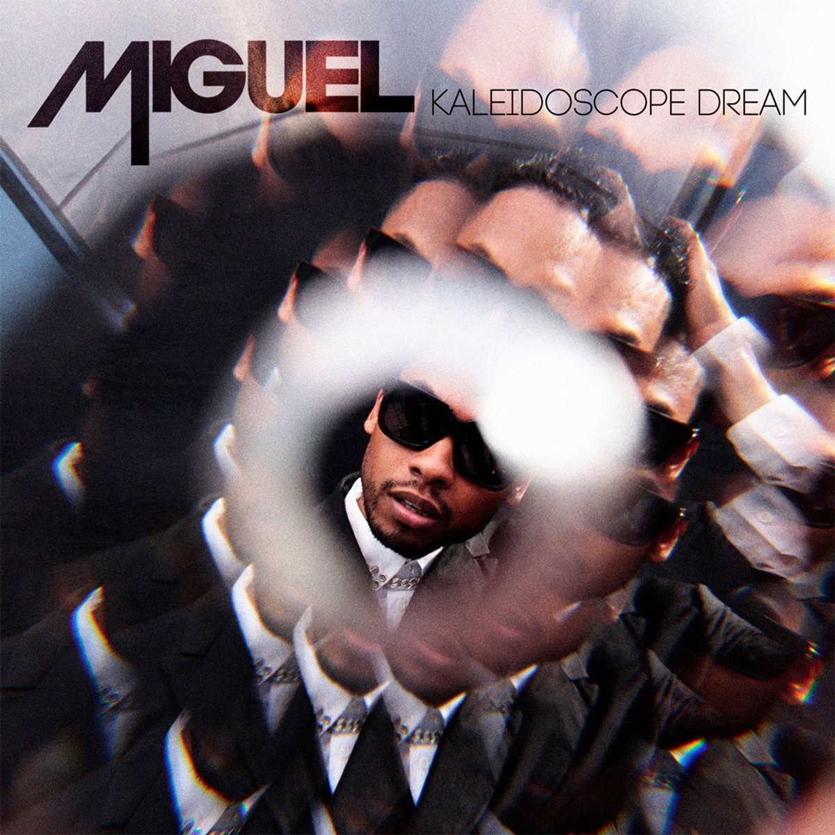 Genius's tweet photo. 14 years ago today, miguel dropped his sophomore album 'kaleidoscope dream' 

the project debuted at no. 3 on the billboard 200 and gave us “adorn,” “do you…,” “how many drinks?” and “arch & point” 

“adorn” went no. 1 on the hot r&b/hip-hop songs chart and earned miguel his first GRAMMY for best r&b song 🏆

what’s your favorite song from this project?