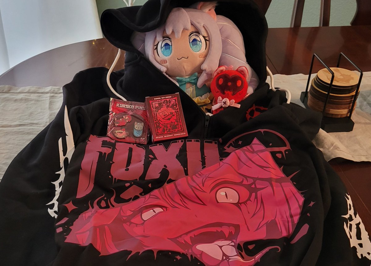 TMastersVA's tweet photo. Cursed merch came in!!!! Everything feels so good!  The hoodie is not thin like most zip ups, the inards are nice and soft on the skin. Love the wallet, it smells great! https://t.co/fSaYBlrJJ1