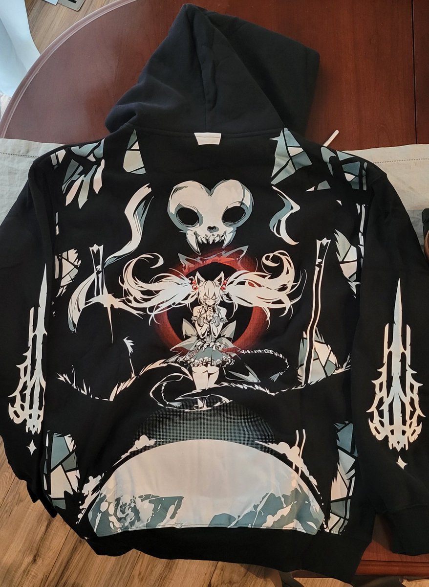 TMastersVA's tweet photo. Cursed merch came in!!!! Everything feels so good!  The hoodie is not thin like most zip ups, the inards are nice and soft on the skin. Love the wallet, it smells great! https://t.co/fSaYBlrJJ1