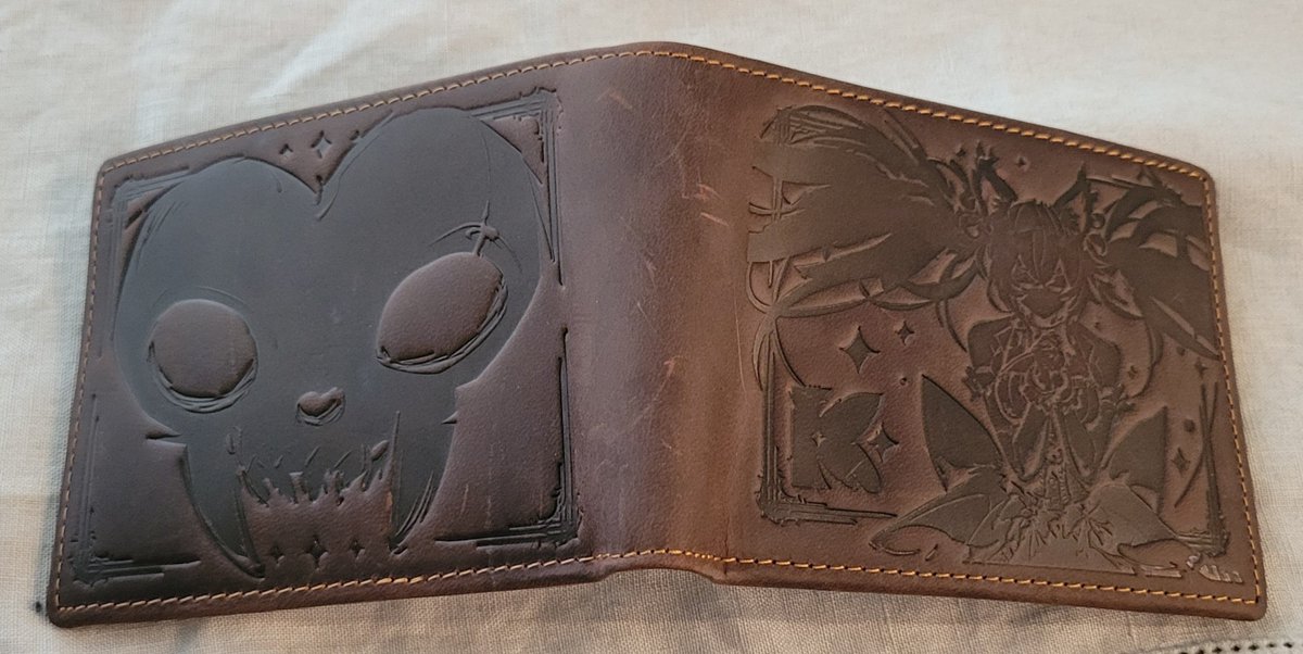 TMastersVA's tweet photo. Cursed merch came in!!!! Everything feels so good!  The hoodie is not thin like most zip ups, the inards are nice and soft on the skin. Love the wallet, it smells great! https://t.co/fSaYBlrJJ1