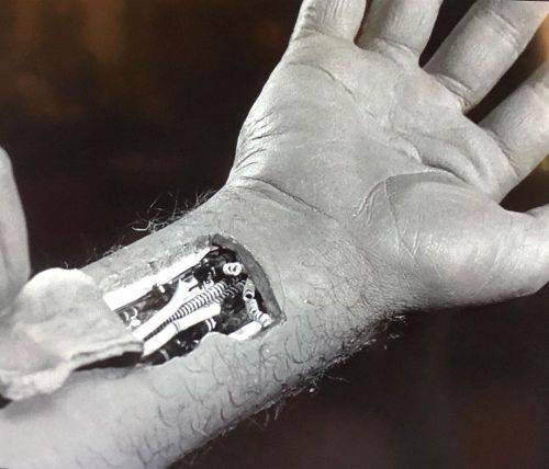 simar_nathan's tweet photo. Dang it! Iโm a robot๐ค
#twilightzone #season4 #charlesbeaumont #rodserling #robot #georgegrizzard #scifi #inhisimage #robotics #blackandwhite #60stv
( source's captions )
This shocked me like I haven't been shocked in years.
This, as the hashtag hints, is from The (original) Twilight Zone. At the point, the main character has an accident which reveals that he is a robot. This specific scene close-up had a huge effect on 11-year-old me as it was quite well-done.
If you're lucky you can track down a video of the scene.