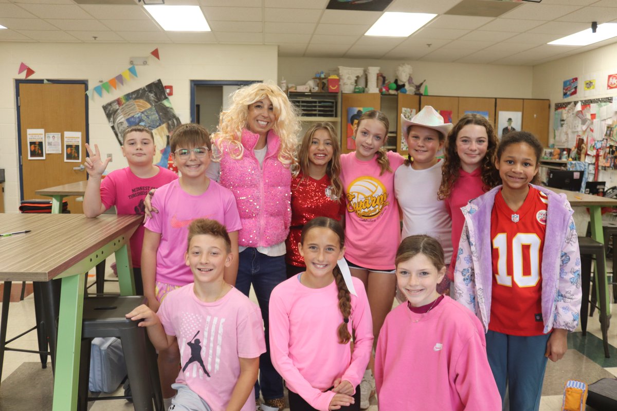 BSSDnews's tweet photo. Students and staff at Delta Woods Middle School celebrated "Dolly Parton Day" also known as "9 to 5 Day" by dressing in pink, sparkles, and fringe.  Students also brought new or gently used books to be donated to the Kansas City Rondald McDonald House.

During this "Give Like Dolly Day," DWMS honored Dolly's memory with a nod to her Imagination Library which has gifted over 332,411,200 books to children over the course of 31 years.

#WeAreBSSD #GiveLikeDolly