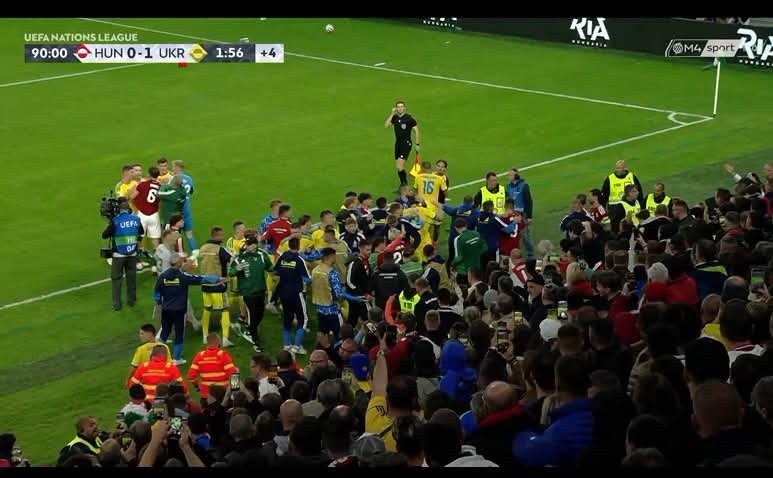Anfield_eraa's tweet photo. 🚨💥 Huge scenes during the Hungary–Ukraine match! Szoboszlai was reportedly targeted and someone tried to attack him. 😳🇭🇺 https://t.co/tQvTMICKfL