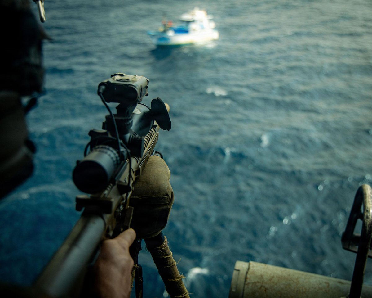 USMarineCorps's tweet photo. Marines search and seize a vessel of interest as part of Joint Task Force Western Hemisphere to disrupt illicit drug trafficking, deter malign actors, and protect our Nation. The vessel was boarded and cleared before being destroyed. https://t.co/kGjfiS9t8T