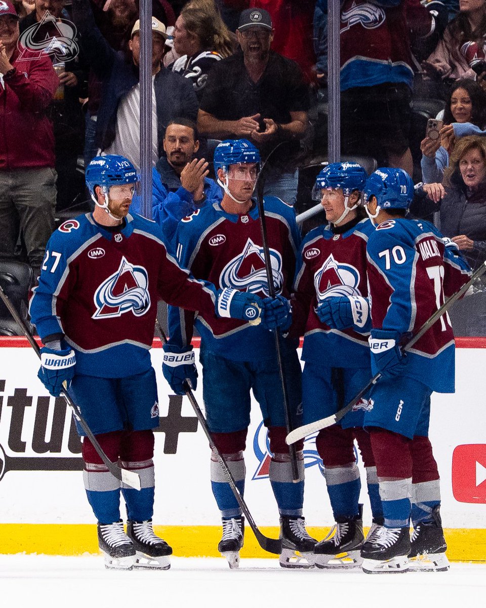 Brett Kulak, Brock Nelson and Sam Malinski surrounding T.J. Hughes after his second goal of the night and period