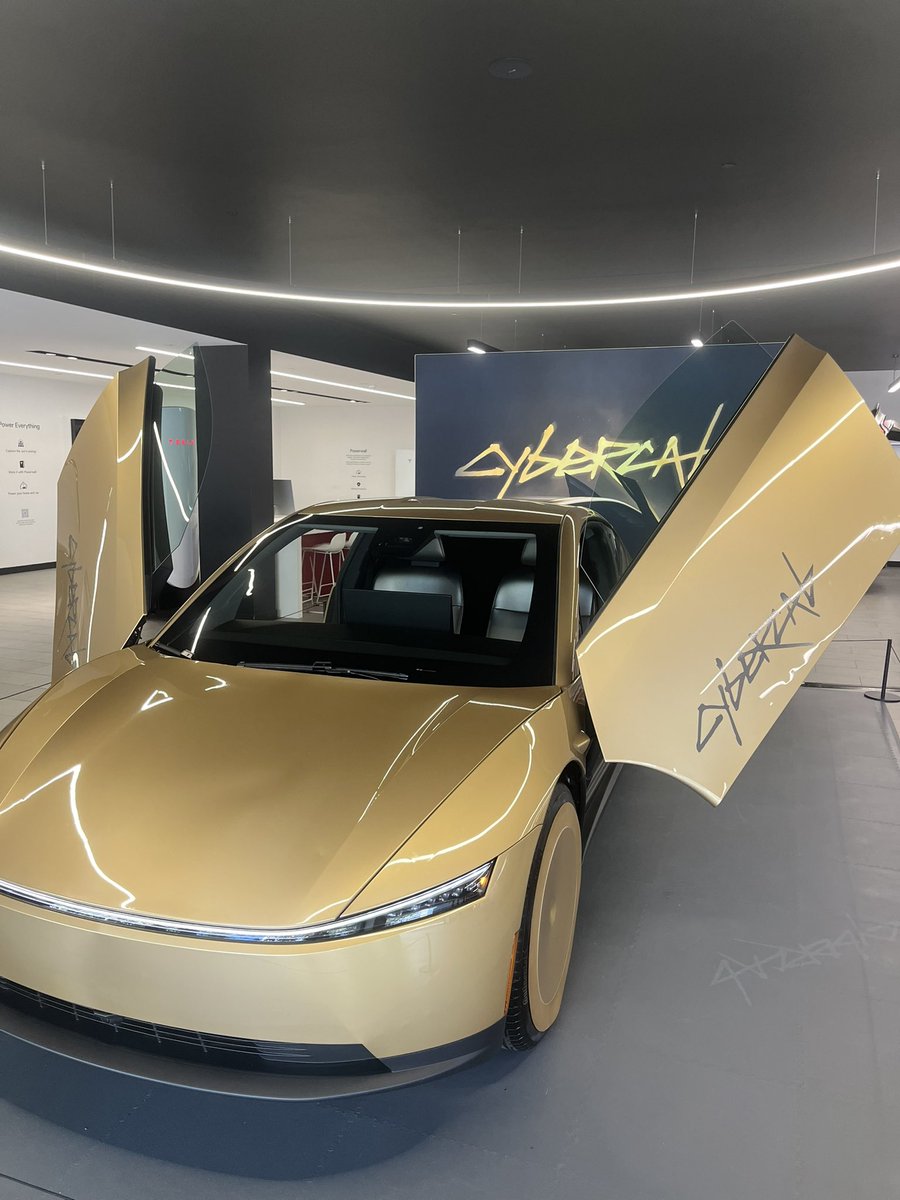 OryonAU's tweet photo. Hahaha, they don’t even let you sit in the Cybercab in Sydney.

Check out this OG Tesla roadster in the shop though https://t.co/7RjNgZqBp6