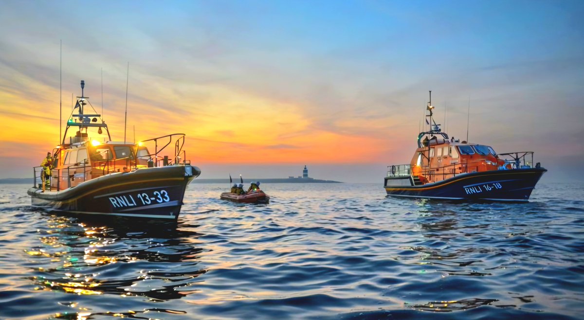 Tim199623's tweet photo. This stunning 📸 "Darkness Into Light"- by Peter Grogan- of RNLI boats from stations near Wexford on an exercise, is breath-taking. #Proud to support this amazing charity, crews, dedicated volunteers, families & all who Save Lives At Sea 🌊. 'Thank you' doesn't even come close. https://t.co/YVxed7nPCg