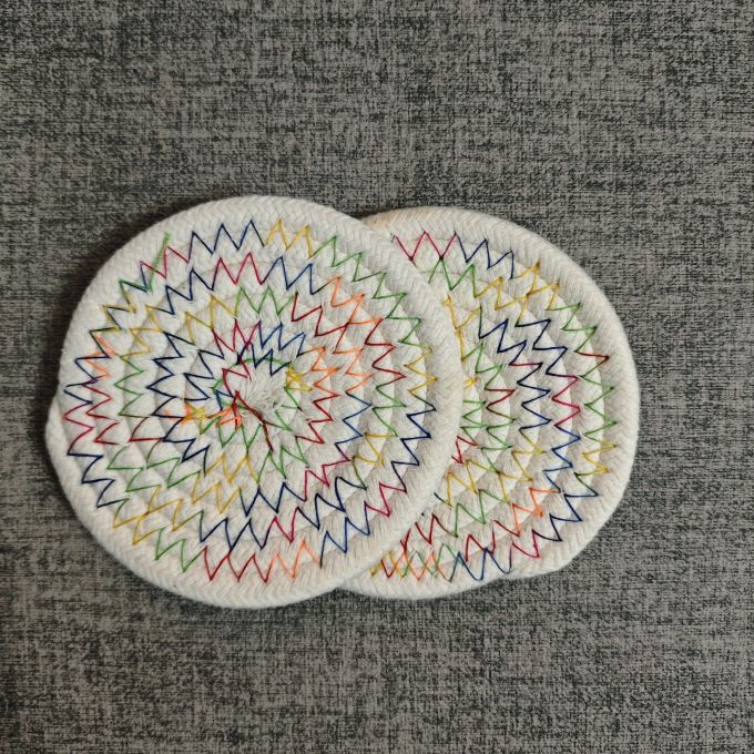 FelipeSzekula's tweet photo. Just finished this hand-knit woven coaster set in soft cream yarn  Perfect for morning coffee mugs—slow craft = happy hands! https://t.co/KRXAP7VHf6