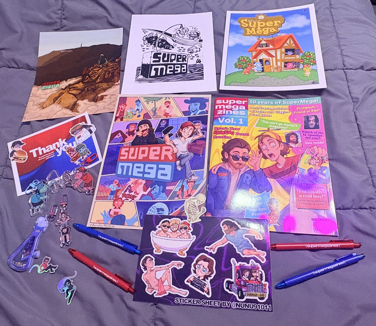 NuNu91011's tweet photo. My contributor bundle came in :D @supermegazines https://t.co/fBg3xvK6tn