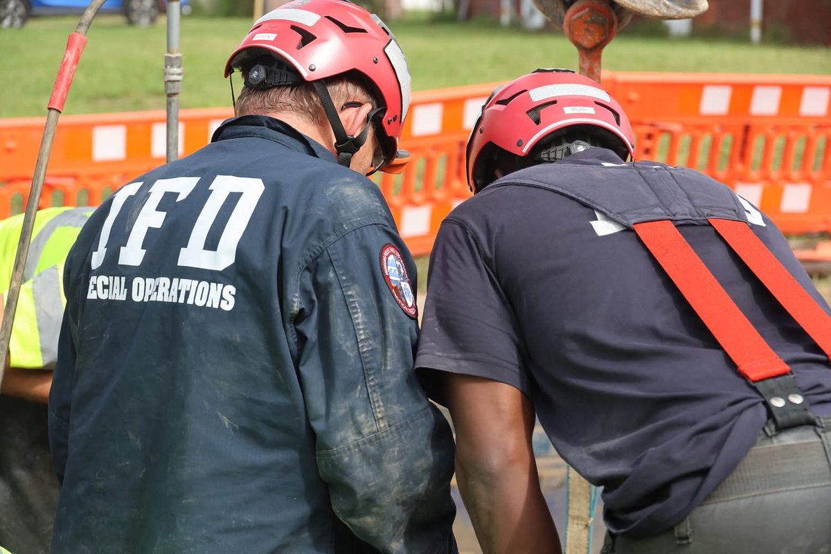 IFD_NEWS's tweet photo. the trench. The Gradex Vac Truck, and workers were vital to the successful completion of this mission.  IFD crews worked in partnership with the Gradex crews to monitor for safety and address removal needs.  As Gabriel was able, he assisted rescuers with removing dirt from https://t.co/z7foOtuTym