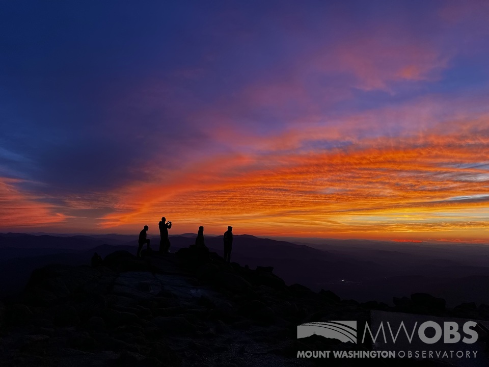 MWObs's tweet photo. Summit staff and volunteers gathered outside for a vibrant sunset tonight as mid- and upper-level clouds roll in ahead of this weekend's storm system approaching from off the Carolina coast. https://t.co/A9WtAuhW7W