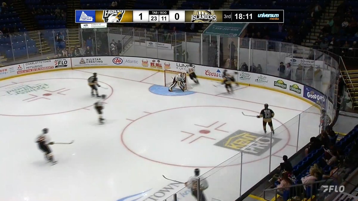 A hockey game broadcast showing the Charlottetown Islanders playing against the Islanders, with the scoreboard indicating a 1-0 score at 18:11 in the 3rd period.