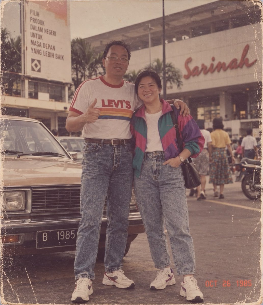 violetthompsonx's tweet photo. Anyo Novita 
Found an old photo from the 1980s, back when I was still dating my hubby. Sorry it’s blurry and unclear—40 years have passed, so the photo has yellowed. This was taken at Sarinah before its renovation. We were so cute back then. View https://t.co/qisKxD1xCF