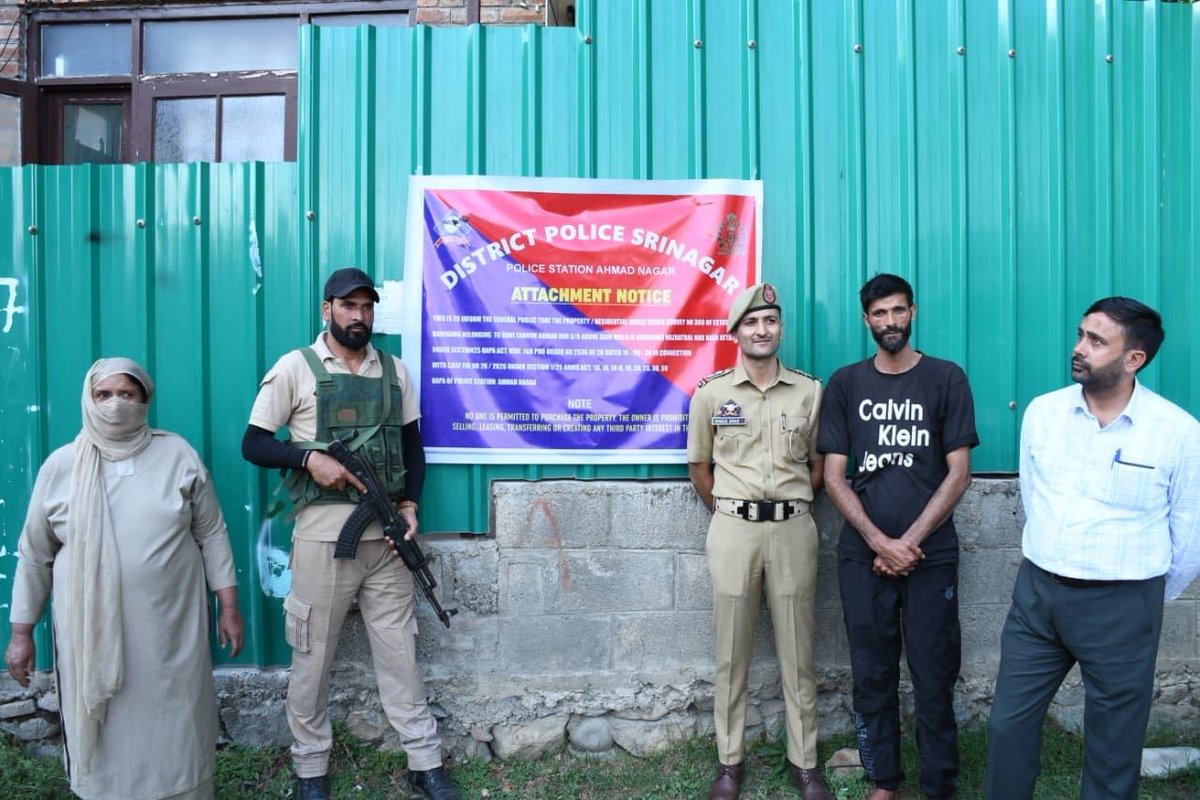 SrinagarPolice's tweet photo. #𝗦𝗥𝗜𝗡𝗔𝗚𝗔𝗥𝗣𝗢𝗟𝗜𝗖𝗘 𝗔𝗧𝗧𝗔𝗖𝗛𝗘𝗦 𝗣𝗥𝗢𝗣𝗘𝗥𝗧𝗜𝗘𝗦 𝗪𝗢𝗥𝗧𝗛 ₹𝟳.𝟭𝟭 𝗖𝗥𝗢𝗥𝗘 𝗟𝗜𝗡𝗞𝗘𝗗 𝗧𝗢 𝗗𝗥𝗨𝗚 𝗧𝗥𝗔𝗙𝗙𝗜𝗖𝗞𝗜𝗡𝗚 & 𝗧𝗘𝗥𝗥𝗢𝗥 𝗔𝗖𝗧𝗜𝗩𝗜𝗧𝗜𝗘𝗦
Continuing its sustained crackdown against drug trafficking, terror-related activities and their financial networks, Srinagar Police has taken legal action against 𝙛𝙤𝙪𝙧 𝙞𝙢𝙢𝙤𝙫𝙖𝙗𝙡𝙚 𝙥𝙧𝙤𝙥𝙚𝙧𝙩𝙞𝙚𝙨 𝙘𝙤𝙡𝙡𝙚𝙘𝙩𝙞𝙫𝙚𝙡𝙮 𝙫𝙖𝙡𝙪𝙚𝙙 𝙖𝙩 𝙖𝙥𝙥𝙧𝙤𝙭𝙞𝙢𝙖𝙩𝙚𝙡𝙮 ₹7.11 𝙘𝙧𝙤𝙧𝙚 under the provisions of the NDPS Act and UA(P) Act. In the latest action, Police Station Zakura attached a residential house along with land at Bilal Colony, Zakura, valued at approximately ₹2.5 crore, belonging to Owais Ahmad Rather S/o Gh. Mohd Rather , in connection with FIR No. 34/2026 U/S 8/22, 29 NDPS Act. The property, identified during investigation as having been acquired in connection with illicit drug trafficking, was attached under Section 68-F(1) of the NDPS Act. The order prohibits its sale, lease, transfer, alteration or creation of any third-party interest until further orders of the competent authority. Earlier, Police Station Nowgam attached property worth approximately ₹2.85 crore belonging to Sheeraz Ahmed Sheikh S/o Nazir Ahmad Sheikh, R/o Wagoora, BK Pora, in connection with FIR No. 121/2023 U/S 8/15 NDPS Act. The property comprises a two-storeyed concrete building, two shops and a rice mill constructed over 18 marlas of land at Wagoora, Tehsil BK Pora. The attachment was carried out under Section 68-F of the NDPS Act after approval of the competent authority. In another action, Police Station Ahmadnagar attached a residential property worth approximately ₹1.30 crore at Danihama, Hazratbal, belonging to Zahoor Ahmad Mir S/o Abdul Gani Mir , in connection with FIR No. 20/2026 U/S 7/25 Arms Act and Sections 13, 18, 18-B, 19, 20, 23, 38 & 39 UA(P) Act. The property, comprising a single-storeyed residential house with appurtenant land measuring 06 marlas, was attached under Section 25 of the UA(P) Act after obtaining prior approval of the competent authority and following due legal procedure in the presence of the Executive Magistrate 1st Class and independent witnesses. Further, Police Station Shalteng froze a single-storeyed residential house along with 07 marlas of land at Check Mujgund, Srinagar, valued at approximately ₹46 lakh, belonging to Amir Ahmad Mir S/o Mohd. Ashraf Mir , in connection with FIR No. 43/2023 U/S 8/21, 29 NDPS Act. Investigation established that the property had been acquired from proceeds of illicit drug trafficking, following which it was frozen under Section 68-F of the NDPS Act. Through these actions, Srinagar Police has attached/frozen four immovable properties having a combined value of approximately ₹7.11 crore, thereby targeting the financial proceeds and infrastructure linked to narcotics trafficking and terror-related activities. Srinagar Police remains committed to identifying, tracing, freezing and attaching properties generated through proceeds of illicit activities and to dismantling the financial networks sustaining drug trafficking and terror activities. @SrinagarPolice reiterates that firm, lawful and sustained action against drug traffickers, terror networks, their associates and financial support structures will continue. @JmuKmrPolice @KashmirPolice @DrGVSundeep_IPS @JKPNMAbiyaan