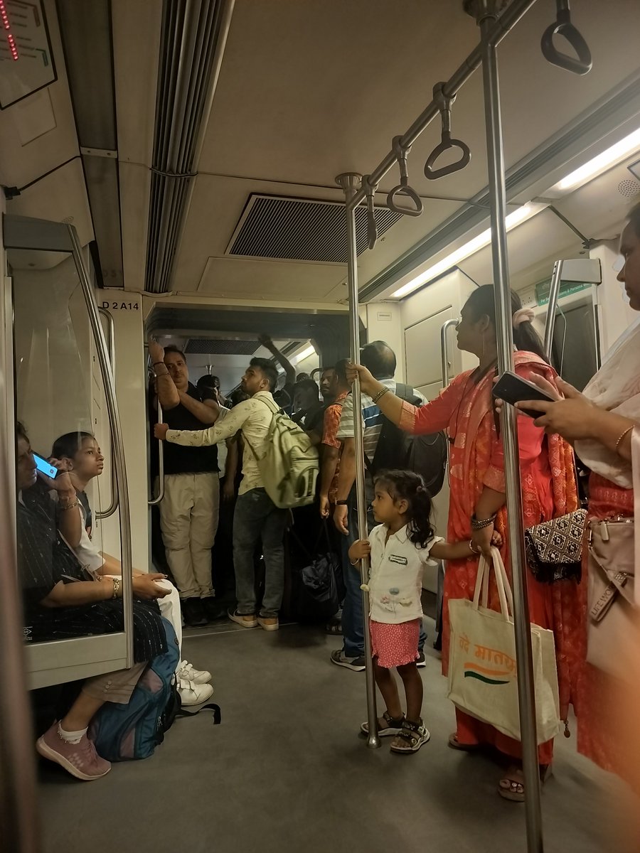 paul_iraa's tweet photo. Some men stood in the women's coach and after being told to move didn't leave entirely. Infact, even exited from the same gate. What's the point of making a different coach for women when authorities don't ensure that this doesn't happen? @OfficialDMRC #delhimetro #yellowline https://t.co/G5vuo2Bwrd