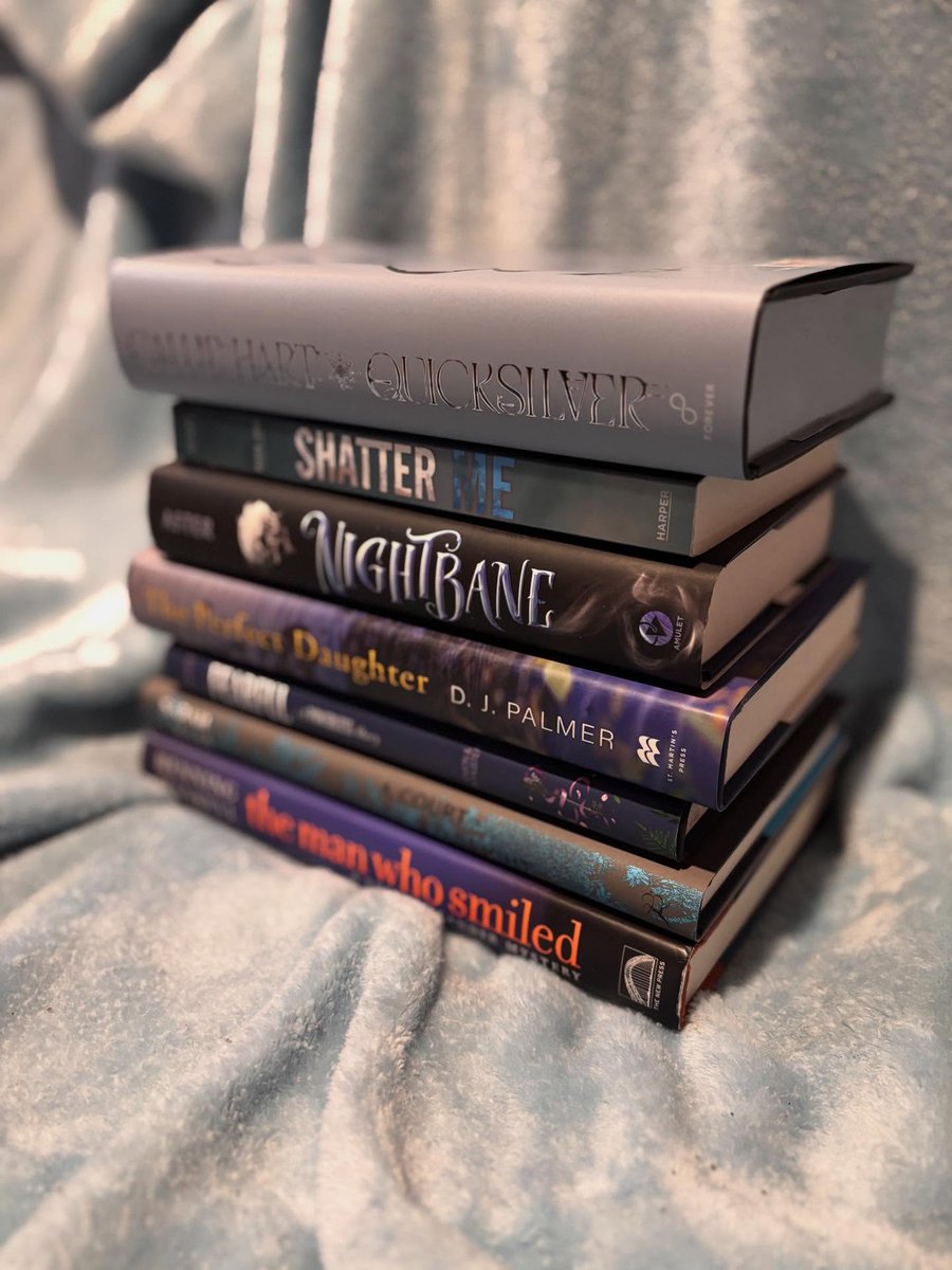 DorisDuenke's tweet photo. Tagged by @kaitlinslibrary11 and @sierras_a_bookgirl. If you’d like to participate, feel free to join even if you weren’t tagged! Finding blue books on my shelves was definitely a challenge. Some aren’t completely blue, but I counted them anyway. https://t.co/XWqa0CWrf9