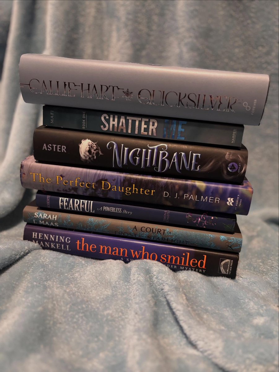 DorisDuenke's tweet photo. Tagged by @kaitlinslibrary11 and @sierras_a_bookgirl. If you’d like to participate, feel free to join even if you weren’t tagged! Finding blue books on my shelves was definitely a challenge. Some aren’t completely blue, but I counted them anyway. https://t.co/XWqa0CWrf9