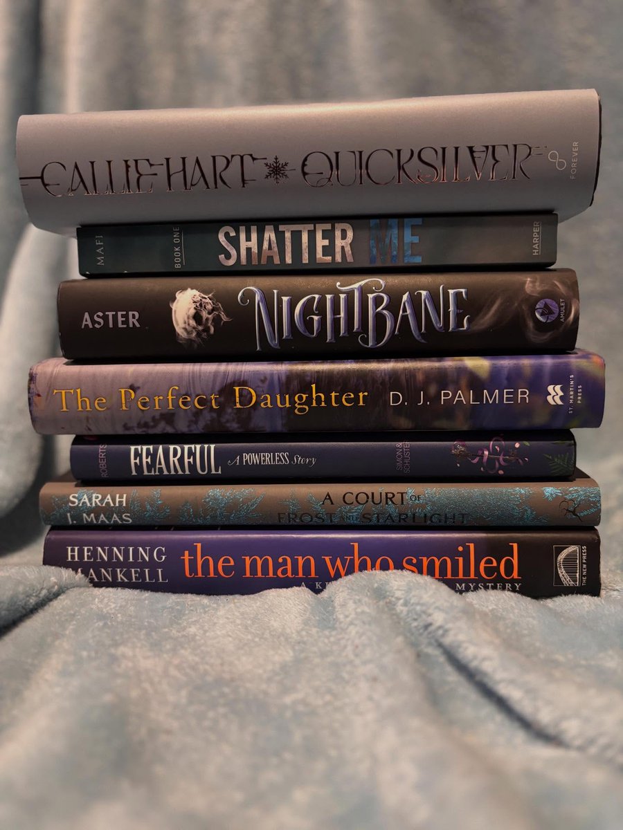 DorisDuenke's tweet photo. Tagged by @kaitlinslibrary11 and @sierras_a_bookgirl. If you’d like to participate, feel free to join even if you weren’t tagged! Finding blue books on my shelves was definitely a challenge. Some aren’t completely blue, but I counted them anyway. https://t.co/XWqa0CWrf9