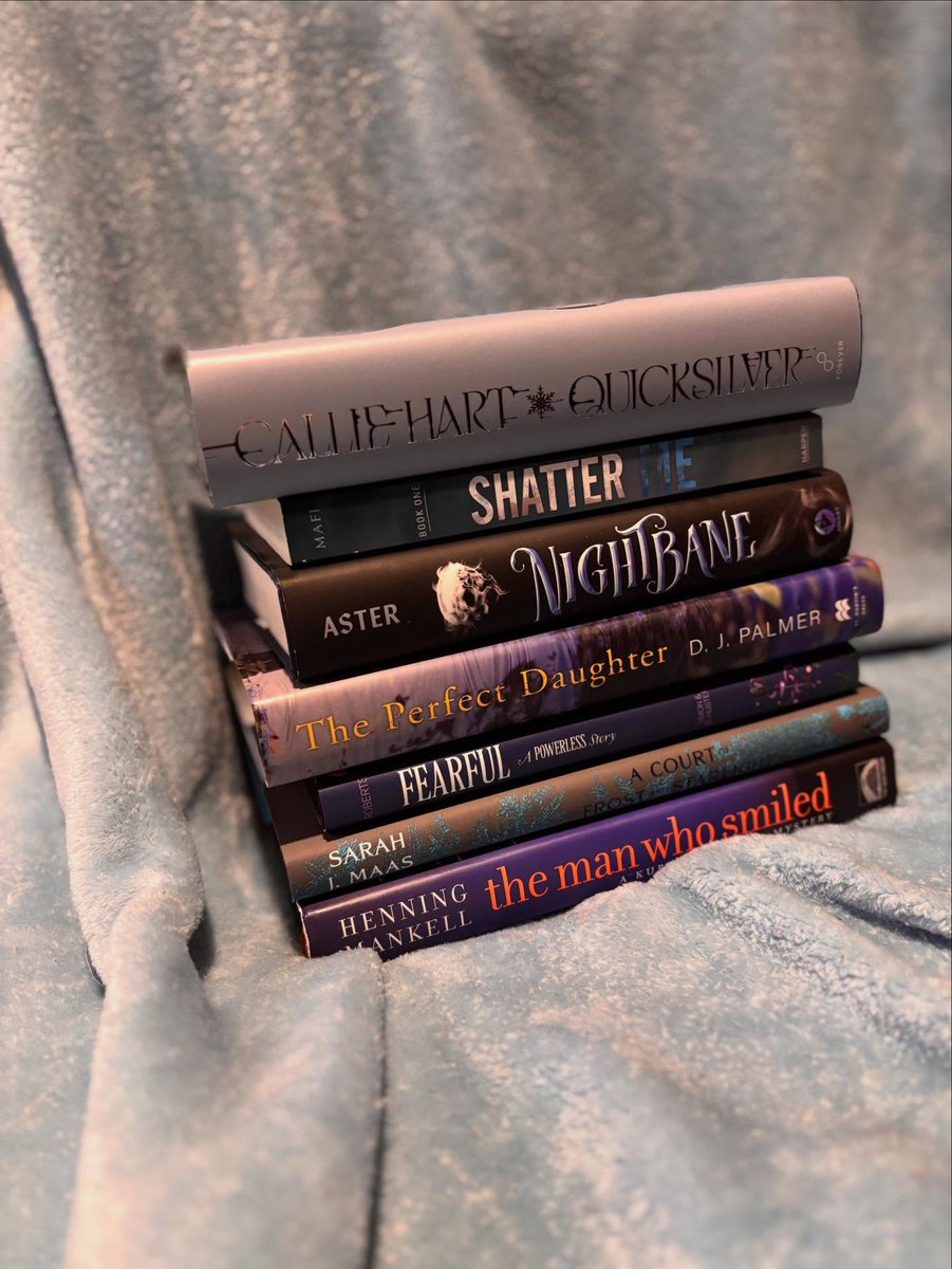 DorisDuenke's tweet photo. Tagged by @kaitlinslibrary11 and @sierras_a_bookgirl. If you’d like to participate, feel free to join even if you weren’t tagged! Finding blue books on my shelves was definitely a challenge. Some aren’t completely blue, but I counted them anyway. https://t.co/XWqa0CWrf9