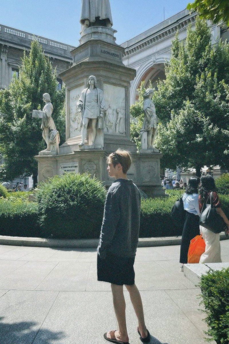 dearestyunoh's tweet photo. strolling through the streets of milan with jaehyun 🤍 https://t.co/UC8tpKInzi