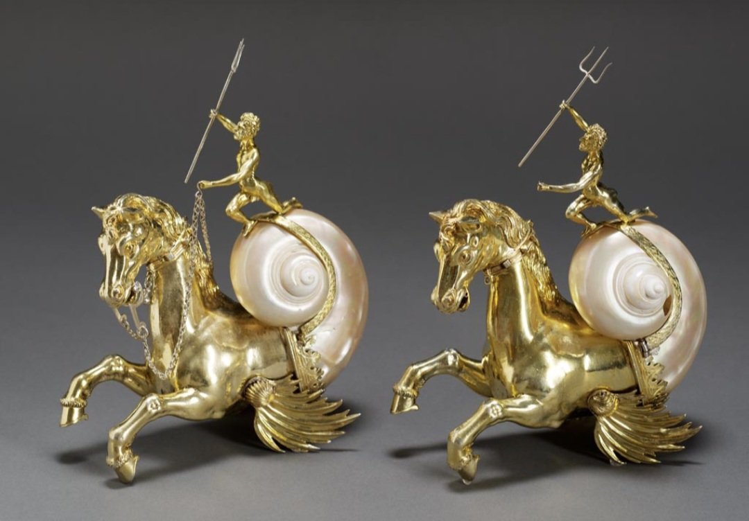 Pasthetique's tweet photo. 16th-century silver-gilt sea-horses rising from turbo shells, with tiny riders adding to their strange beauty. Renaissance craftsmanship at its most imaginative. https://t.co/QBin4xu8PG