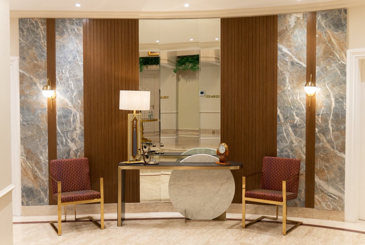 DewittFrattali's tweet photo. Before and after: Where first impressions become unforgettable. This villa lobby combines elegant porcelain cladding, warm wood textures, and bespoke furnishings to create a refined, inviting space that makes an impact from the moment you arrive. https://t.co/TVIRXdaBtU