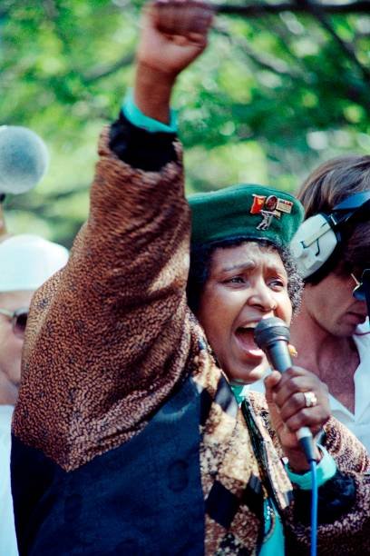 HistorySAZAR's tweet photo. Winnie Mandela leading a march in Cape Town, 1990s. Credit: Rashid Lombard https://t.co/f91Uo6dBYU