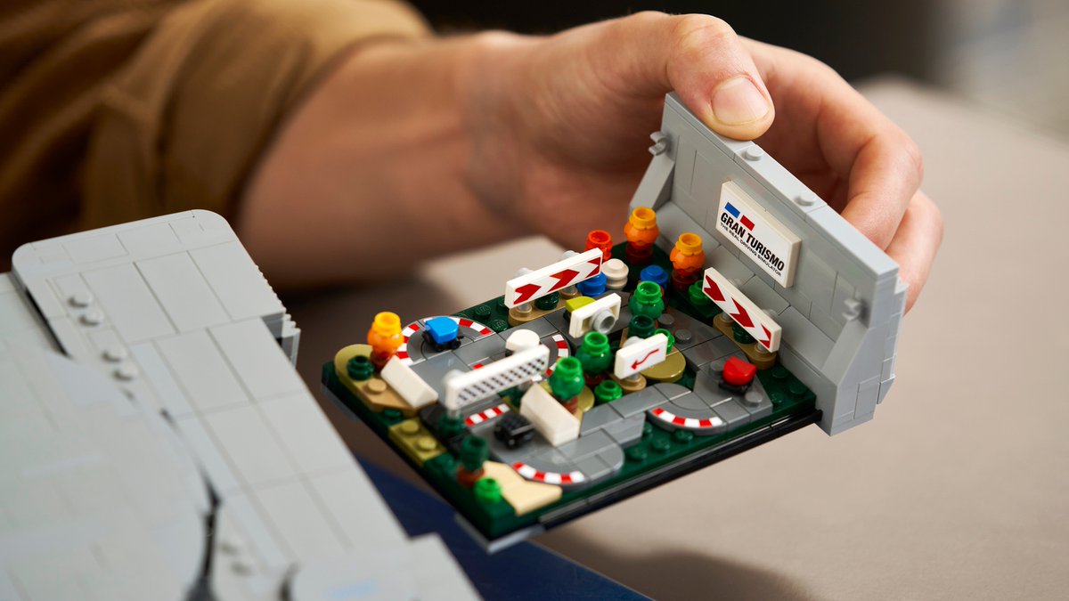 followtreasures's tweet photo. LEGO puts two game worlds inside its PlayStation. Open the grey console and out come Gran Turismo and Ape Escape. A closer look before October. https://t.co/4fdZQ0Unco ©2026 The LEGO Group. https://t.co/sOMVHj7Da9