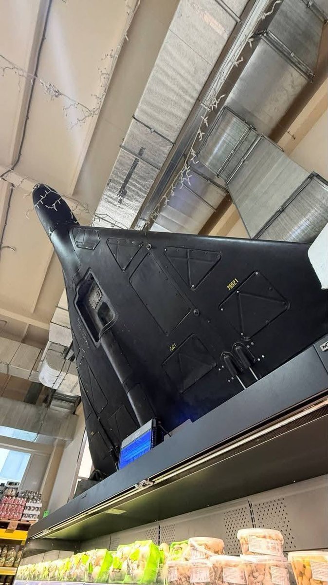 bayraktar_1love's tweet photo. One of the Russian Shaheds downed over Ukraine has ended up as decoration in a local supermarket. https://t.co/8eFlkZKntx