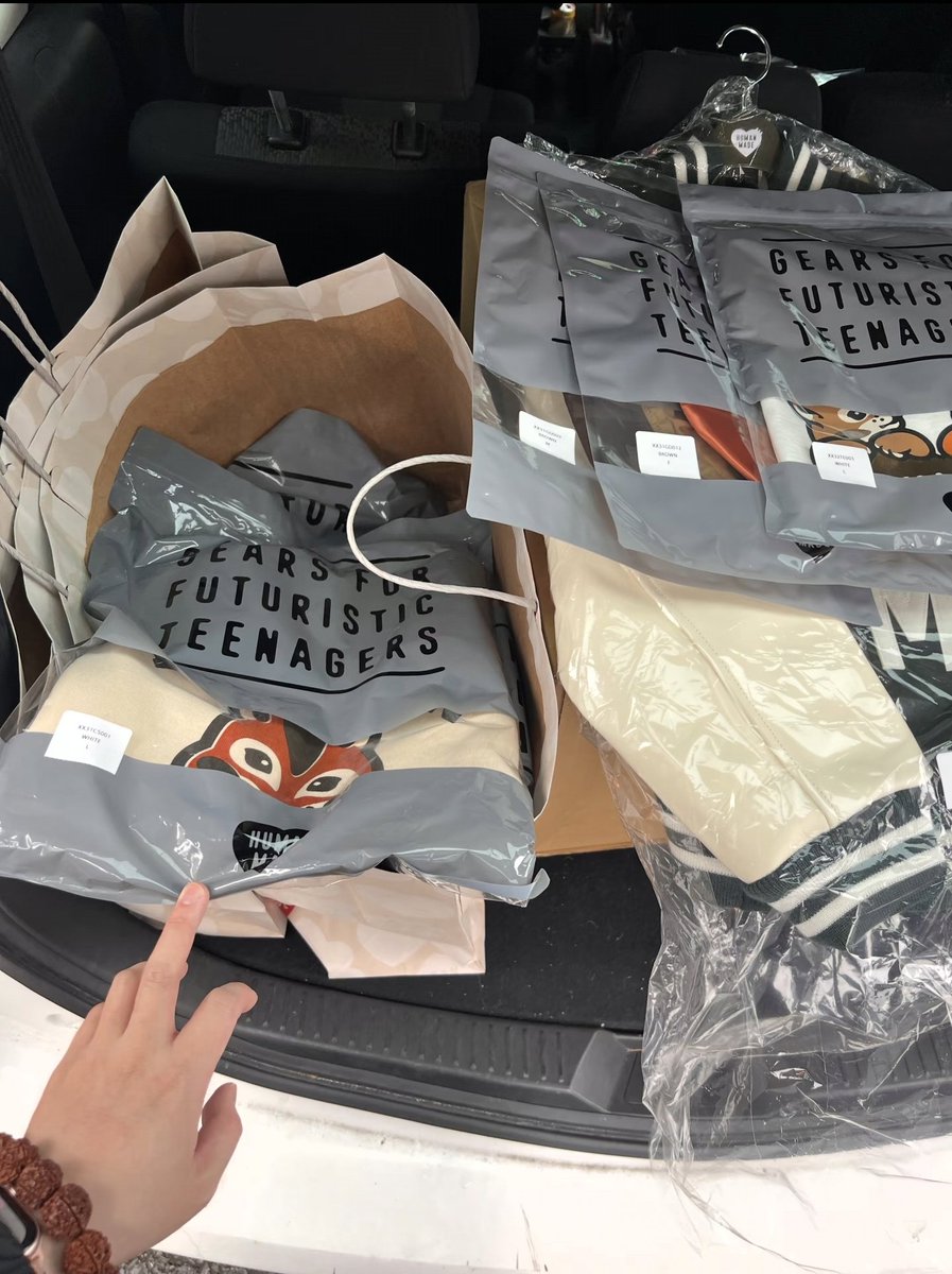 HobiCasa's tweet photo. These men loving the HUMAN HOPE S2 collection! The line up outside is crazy, it is by lottery. https://t.co/78RDWGNwij