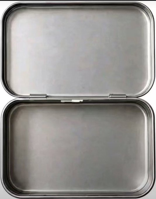 An open empty silver metallic tin or storage box with a hinged lid, photographed from above against a white background.