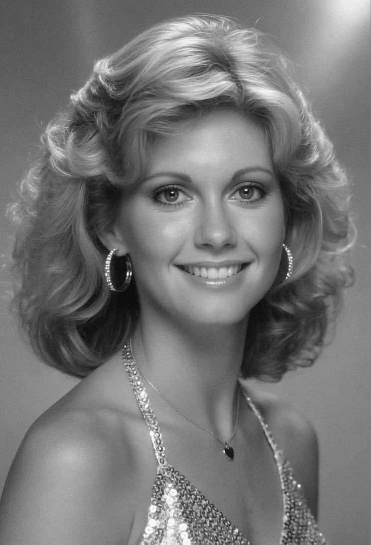 Kitten2402's tweet photo. Remembering Dame Olivia Newton-John (1942 - 2022) 🌺 https://t.co/Dc4gcbldWe