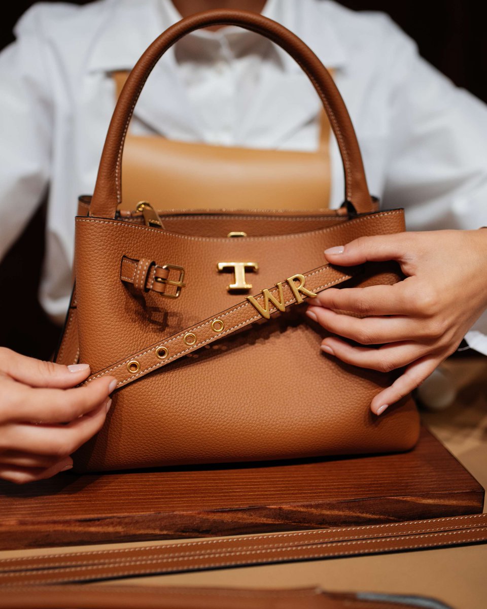 Tods's tweet photo. Stitch by stitch, dot by dot, letter by letter. At the Spring-Summer 2027 Women's Fashion Show in Milan, Tod's artisans brought the brand's Artisanal Intelligence to life with meticulous attention to detail and the finest materials. From the Metal Dots Gommino loafer, where the brand's distinctive code takes on a new expression, to the T Signature bag personalised with golden-metal initials through the exclusive My Signature project, each piece becomes a unique expression of craftsmanship and identity.
#Tods