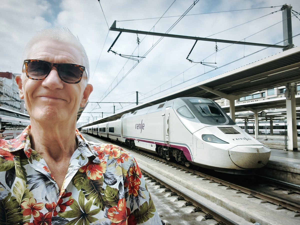 CaptainSensible's tweet photo. It's cheesy grins all round from punk rock trainspotter extraudinaire @captainsensible as @thedamned prepare to board the Valencia to Barcelona train for tonight's show at Club Razzamatazz. #Visorfest was 🔥.. &amp; so were we 🎸🎸🎸 Yeah baby! 😎 https://t.co/UuzPTGgJ8D