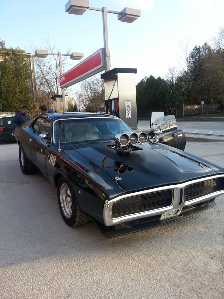 RestoMod804's tweet photo. Dodge Charger R/T— Look at the body lines. Fastback roof, deep quarters, chrome bumper hugging steel. Black on black art.
#RestoModClassics https://t.co/FkezmASdiY