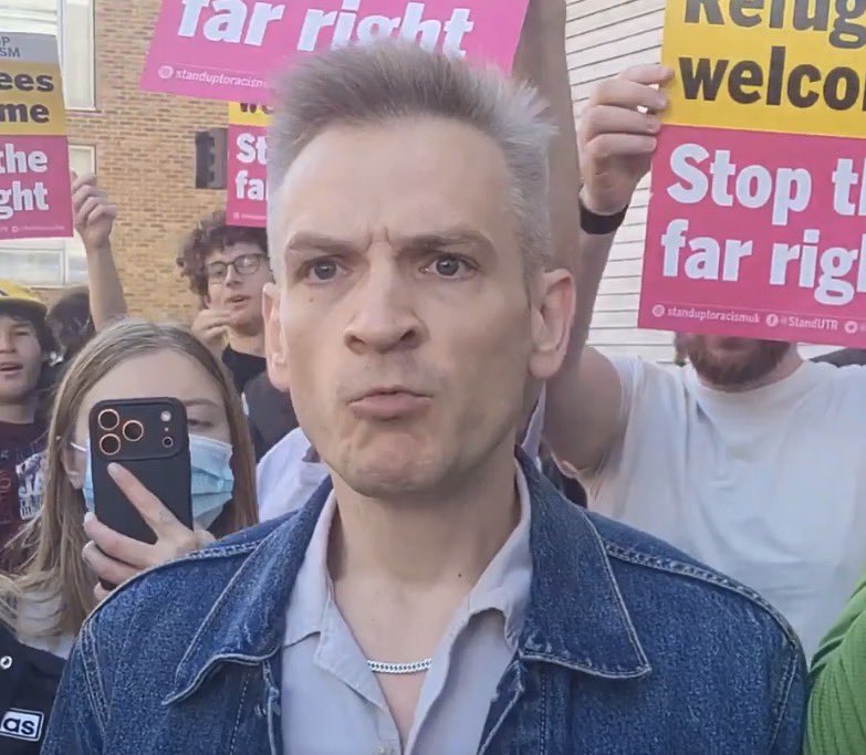 NewsGBOfficial's tweet photo. Let’s ruin his life. 

The man in this video has been identified as Richard Donnelly, a PhD researcher at Kingston University London.

Facebook posts of his talks are deeply disturbing.

@KingstonUni fire him immediately. https://t.co/Vb41iZr0md