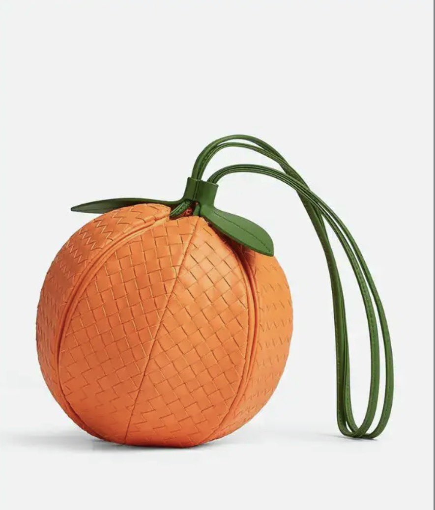 pmamtraveller's tweet photo. Bottega Veneta Orange Multi-Pouch crafted in signature Intrecciato woven leather, which unzips and fans out into four distinct segmented compartments resembling a sliced orange. https://t.co/SVVL2HXfRV