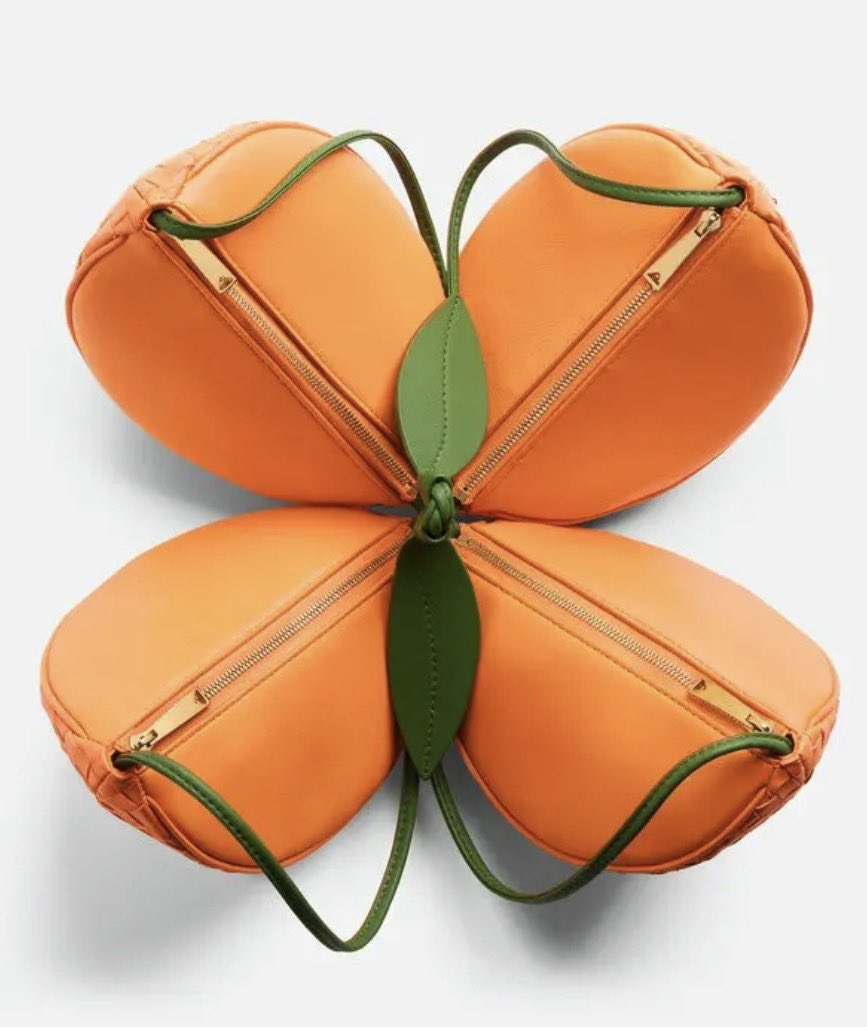 pmamtraveller's tweet photo. Bottega Veneta Orange Multi-Pouch crafted in signature Intrecciato woven leather, which unzips and fans out into four distinct segmented compartments resembling a sliced orange. https://t.co/SVVL2HXfRV
