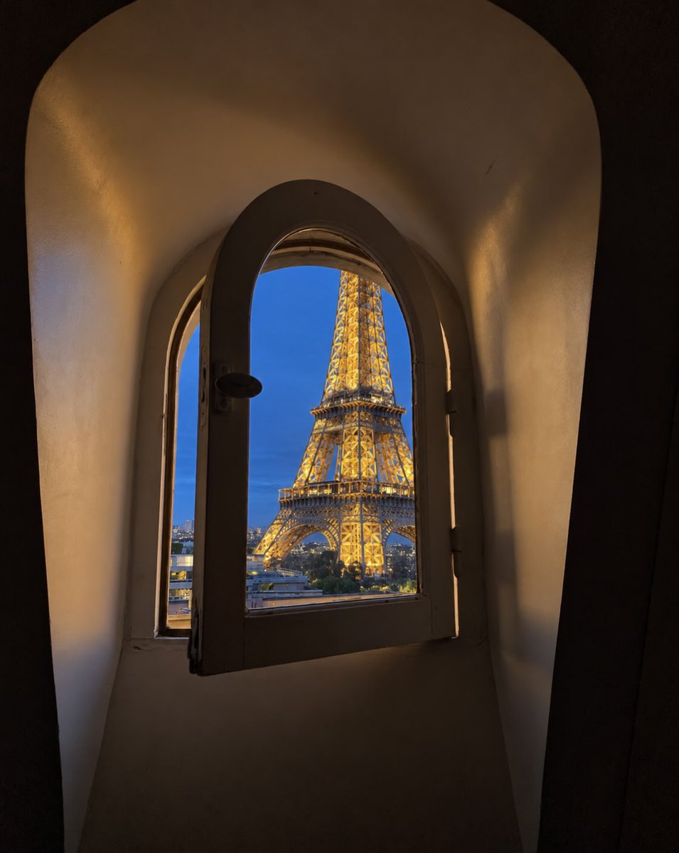 Parisianaes1's tweet photo. The Eiffel Tower through an arched window at blue hour.

Paris, framed like a secret. https://t.co/FeHN4LoYob