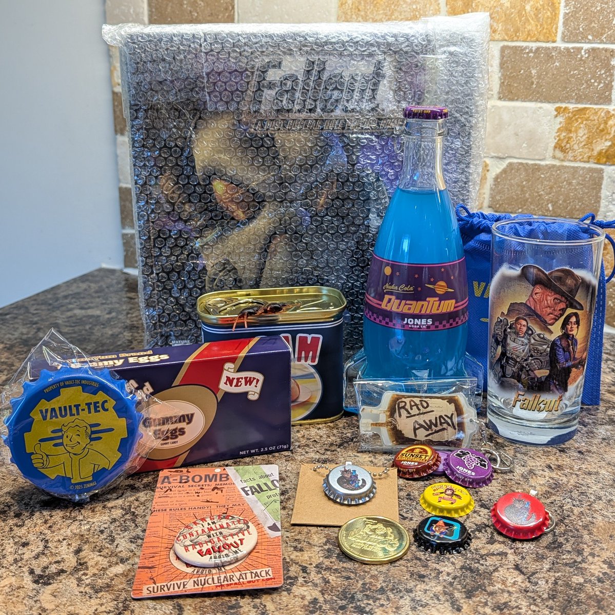 VaultOfDaedalus's tweet photo. Received this wonderful parcel of Wasteland goodies from @mrsfallout and @MisterFallout this morning - thank you both so much! 💙☢️💛 https://t.co/hMTX1gqpSS