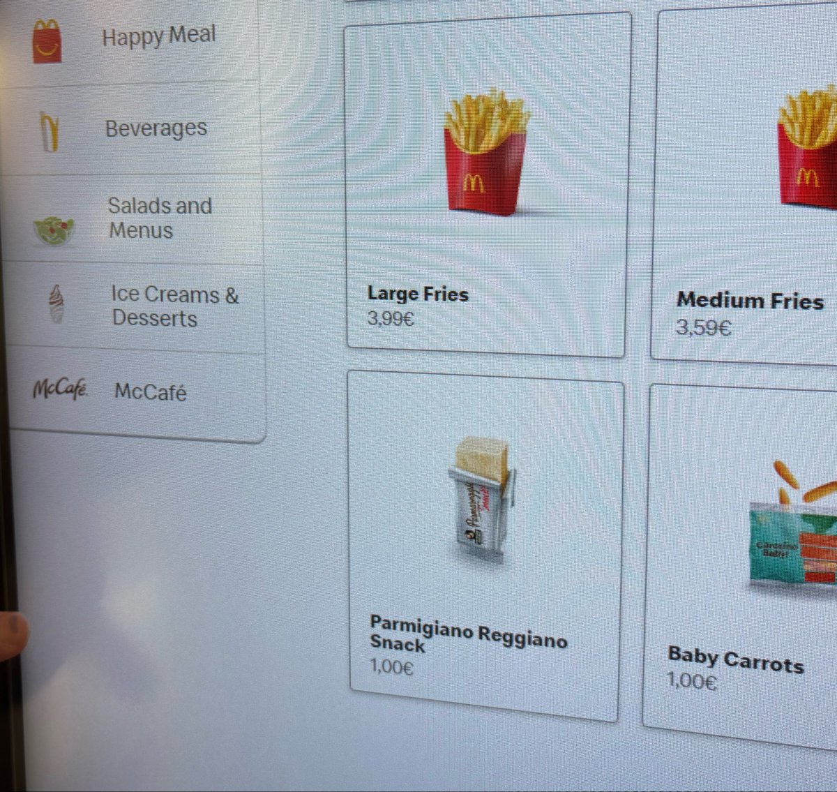 nkkdntn's tweet photo. remembering when i was in rome and the mcdonald’s had a block of parmesan cheese on the menu. https://t.co/IAuiFlWvkZ