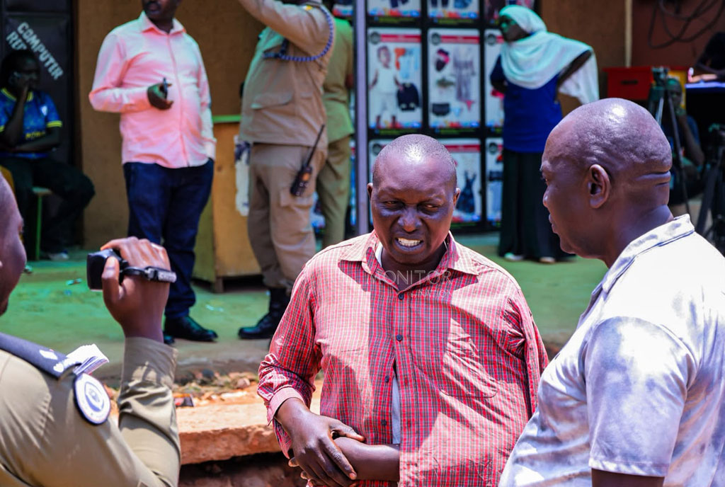 DailyMonitor's tweet photo. Under tight security led by KMP CID Commander Milton Birungi Beigumamu, Kabalagala Division Commander Akongo Francis, and CID Kampala South Regional Commander Arthur Twiinamatsiko, suspects Vincent Arnold Nsamba (alias Sitenda) and Rose Tusiime reconstructed the tragic night that ended with the fatal attack on legendary band musician Moses Matovu for the Uganda Police. The pair detailed the chain of events that began at a local bar and culminated in the physical altercation that claimed the life of the Afrigo Band icon.

#MonitorUpdates

📸Ibrahim Kavuma