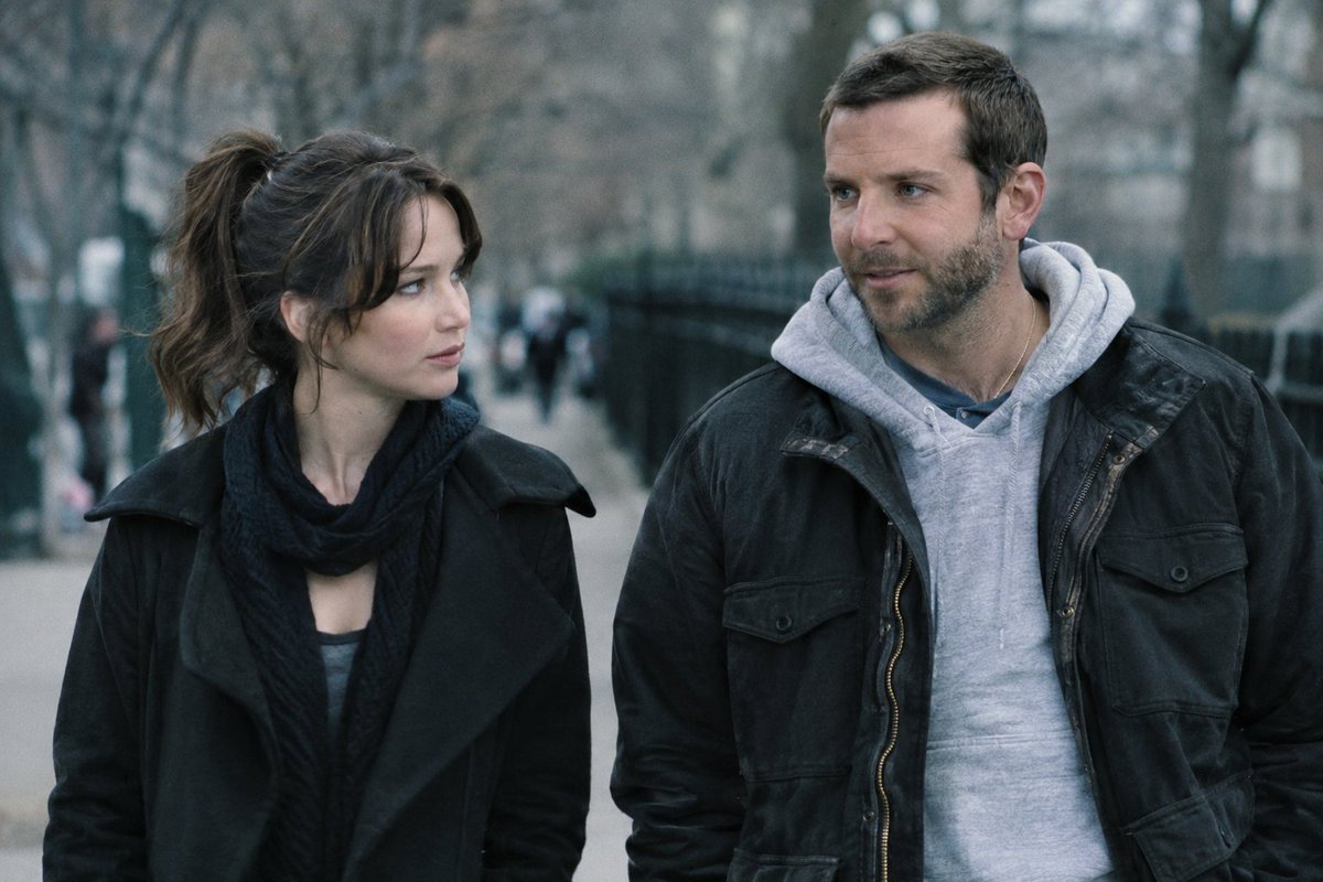 Uzonna7's tweet photo. Silver Linings Playbook (2012)❤️🔥⭐⭐⭐ 

Silver Linings Playbook isn’t a rom-com. It’s a 2-hour PSA that the only way two mentally unwell people get better is by finding someone equally chaotic to dance with. 

Bradley Cooper’s rage walks and Jennifer Lawrence’s “I hate everyone” energy fixed more people than therapy ever could.

The real love story in Silver Linings Playbook isn’t Pat and Tiffany. It’s Pat and his dad’s Eagles obsession. That Super Bowl bet scene is the purest form of dysfunctional family love ever put on screen. Everything else is just the subplot.

Hollywood spent decades making mental illness look like soft lighting and sad piano. Then David O. Russell said “hold my meds” and gave us a bipolar man who throws a book through a window because Hemingway is too depressing, and a widow who uses sex as a coping mechanism. Peak cinema. No notes.

Jennifer Lawrence’s “I’m not crazy, I’m just a little unorthodox” energy in this movie should be studied. She didn’t just play Tiffany Maxwell, she weaponized grief, rage, and a sequined dress into the most magnetic performance of the 2010s. Oscar was deserved. Period.

⭐Synopsis: Imagine getting out of a mental hospital, moving back in with your parents, finding out your wife is gone, then meeting a girl who lost her husband and uses sex the way you use exercise. 

Now add ballroom dancing and an Eagles Super Bowl bet. That’s not a plot. That’s a fever dream that somehow became one of the best films of the decade.
