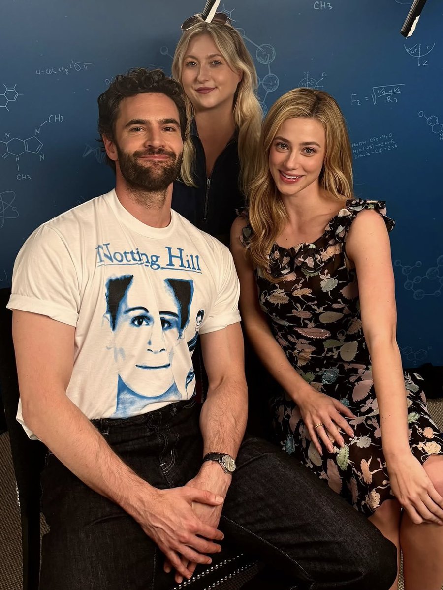 TomBateman_'s tweet photo. Doing press with Lili Reinhart for The Love Hypothesis. Always a good time when we get to sit down together. Also, had to turn up wearing one of my favourite movie tees then there’s a fanboy moment: Olivia Dean. I’ll let you take a guess at which one of her songs I love the most. https://t.co/C4SenneQZh